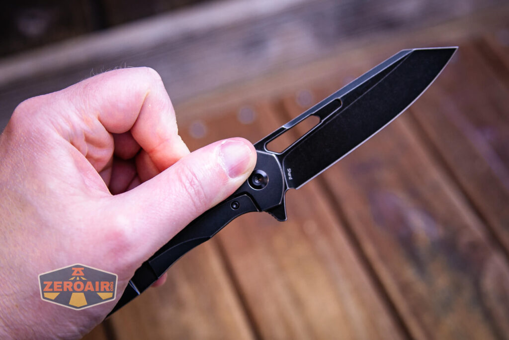 Kansept Shard blackwashed titanium knife opened via flipper tab
