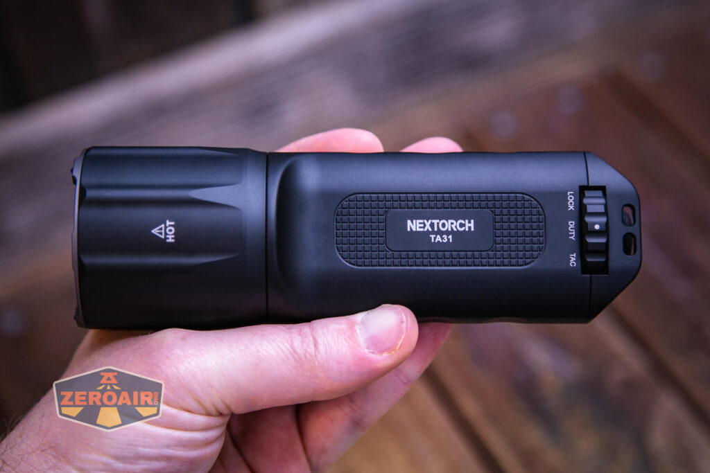 Nextorch TA31 tactical searchlight in hand
