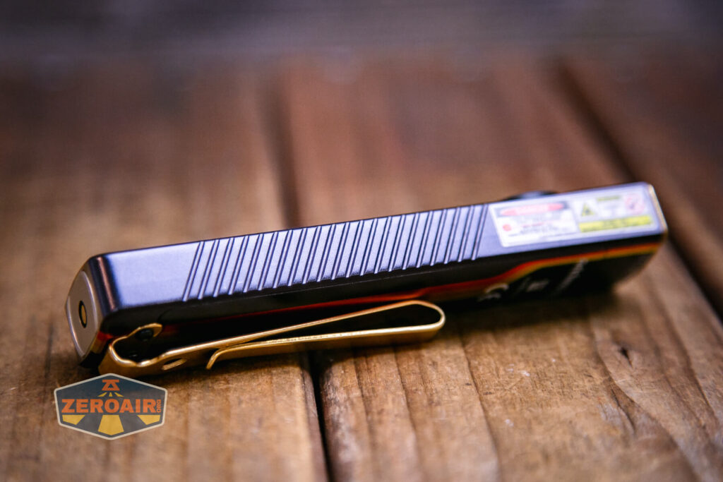 Olight Arkfeld Pro Racing Stripes flashlight side grip view