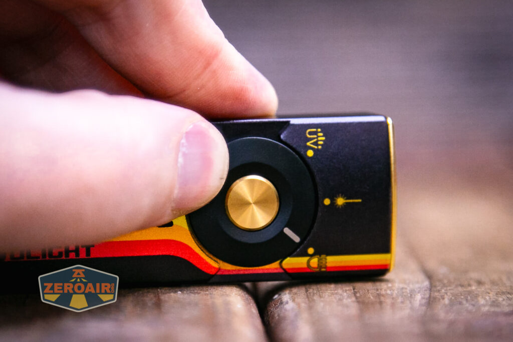 Olight Arkfeld Pro Racing Stripes flashlight rotary switch setting