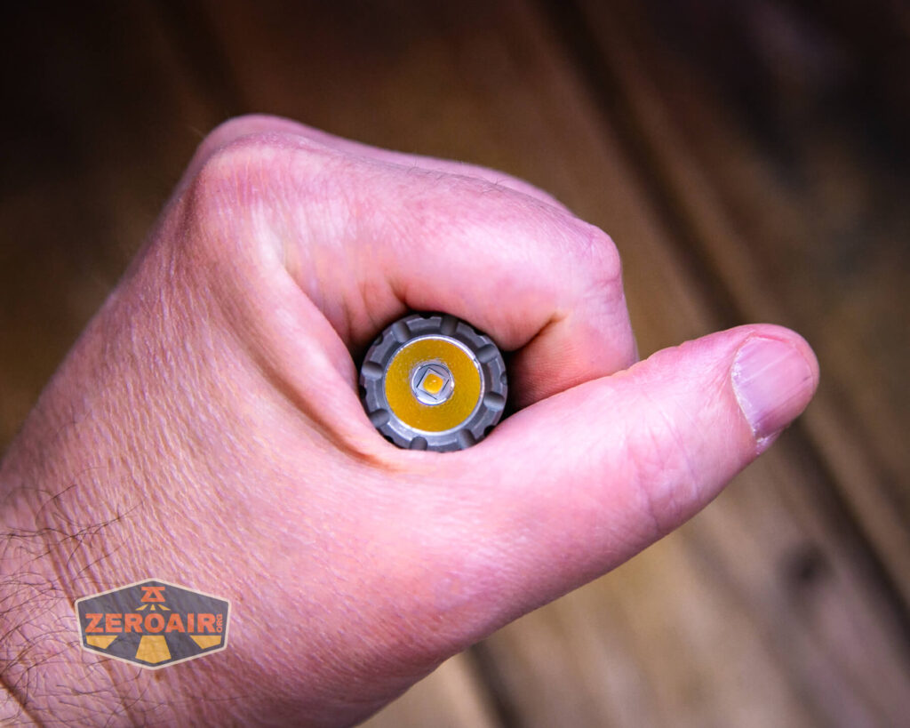 EDC Titanium 14500 flashlight in hand
