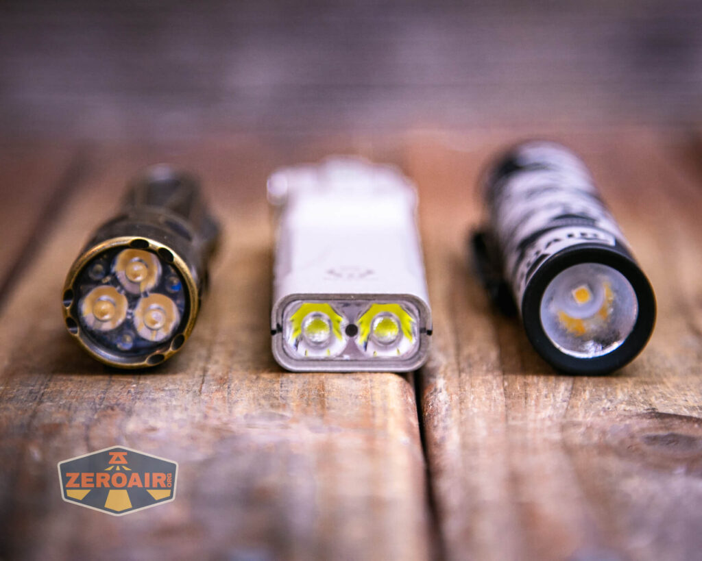 with two standard sized flashlights