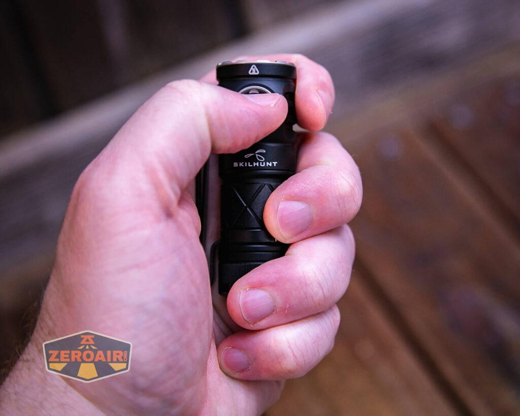 Skilhunt EC200S-Red Mini EDC flashlight in hand