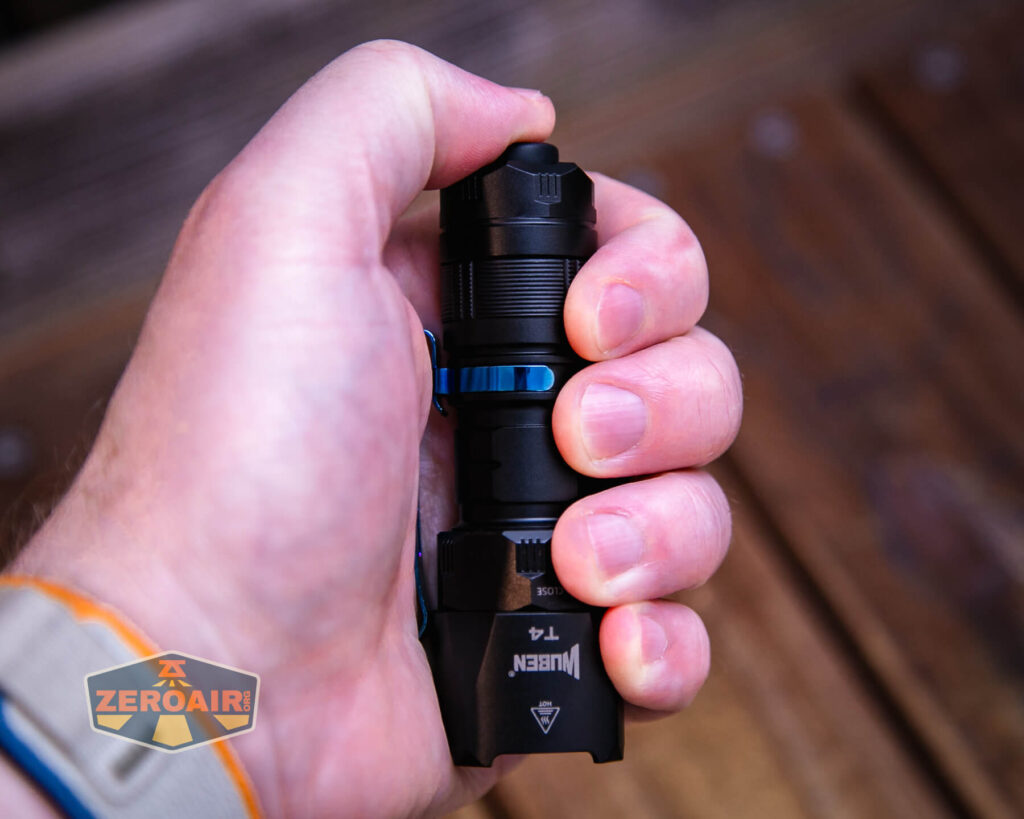 Wuben T4 tactical flashlight in hand
