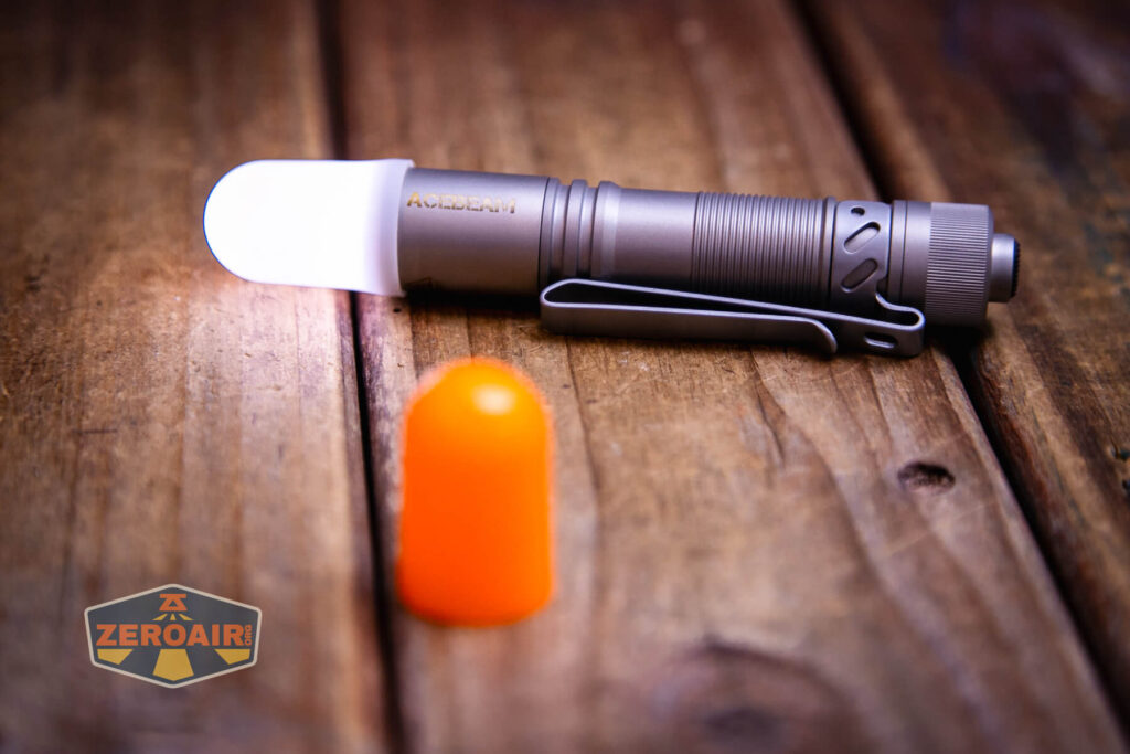 Acebeam Pokelit AA Ti 10th Anniversary flashlight with white diffuser on