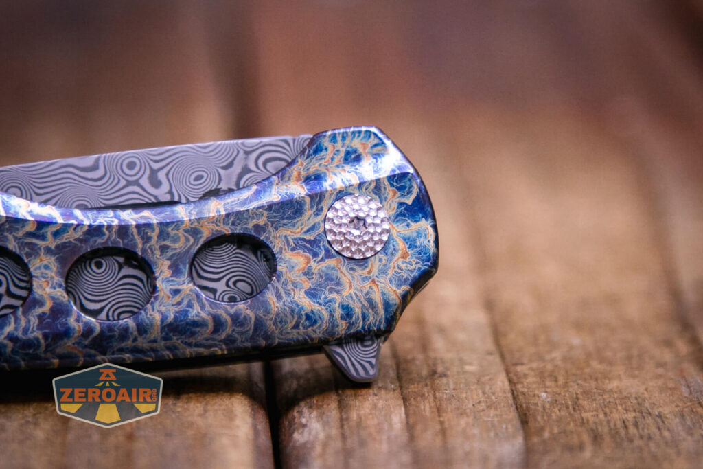 Kansept Cassowary titanium flipper knife pivot screw