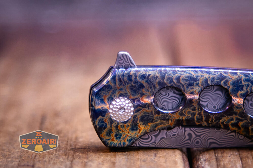 Kansept Cassowary titanium flipper knife flipper tab