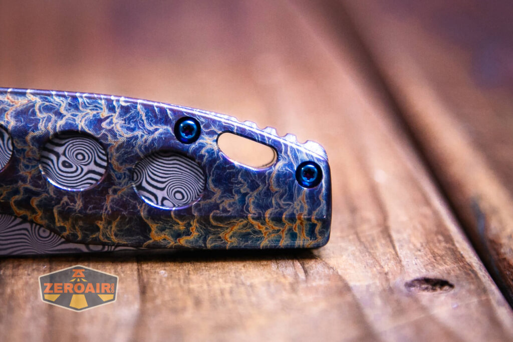 Kansept Cassowary titanium flipper knife lanyard hole