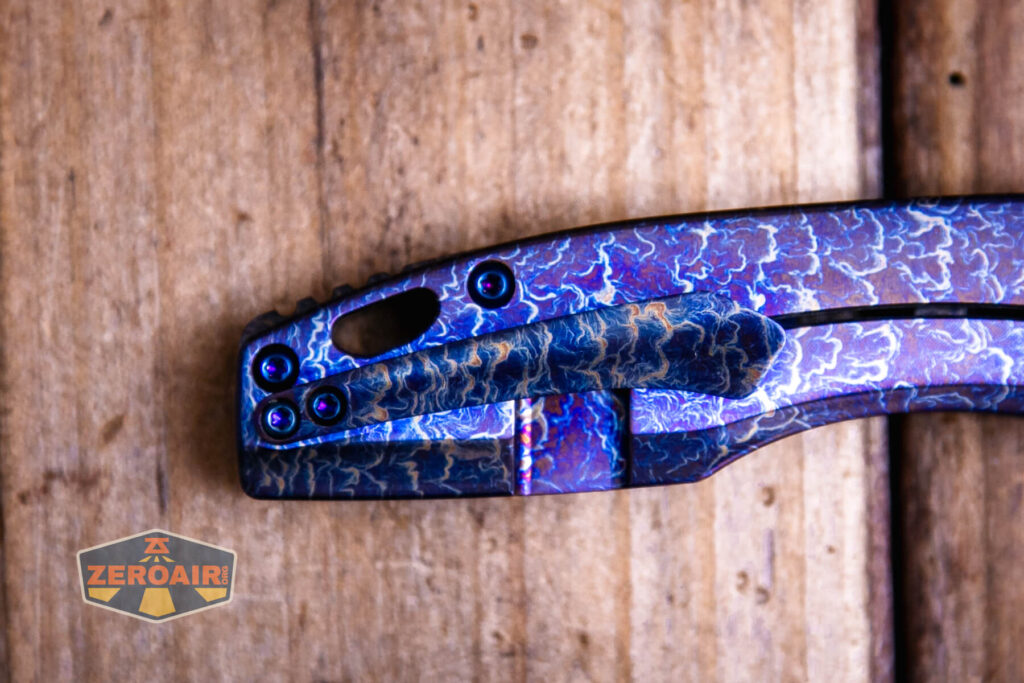 Kansept Cassowary titanium flipper knife lanyard hole