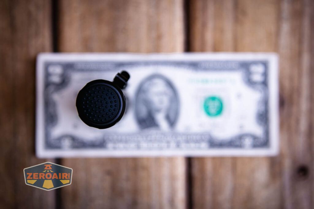 Speras ST20 tactical flashlight on a two dollar bill