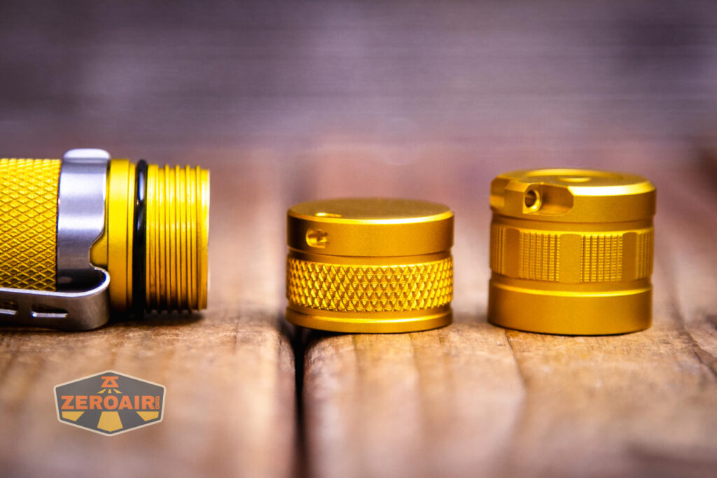 Wurkkos Golden WK03 flashlight showing two tailcaps and threads