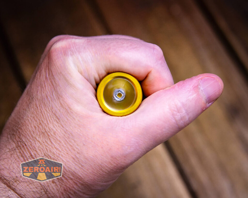 Wurkkos Golden WK03 flashlight in hand