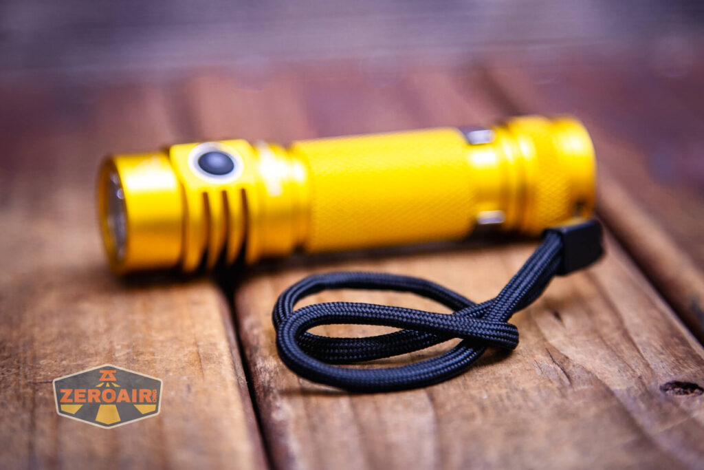 Wurkkos Golden WK03 flashlight with lanyard installed