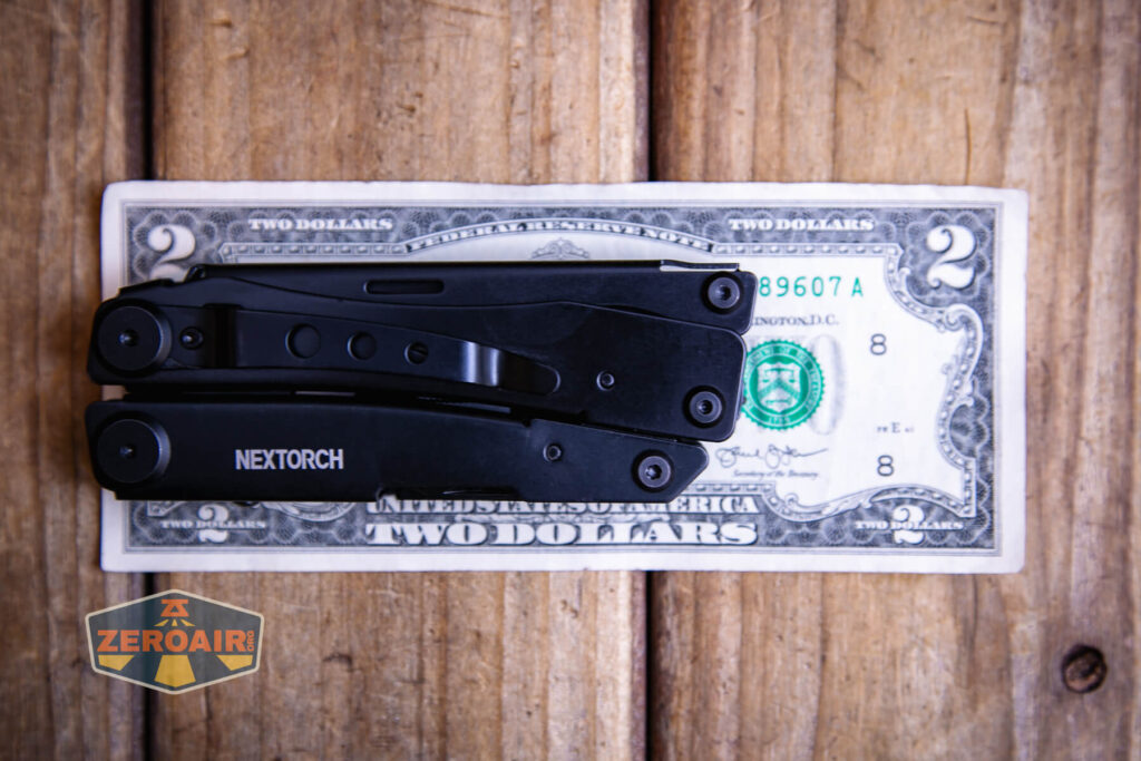Nextorch MT10 multi-tool on a two dollar bill