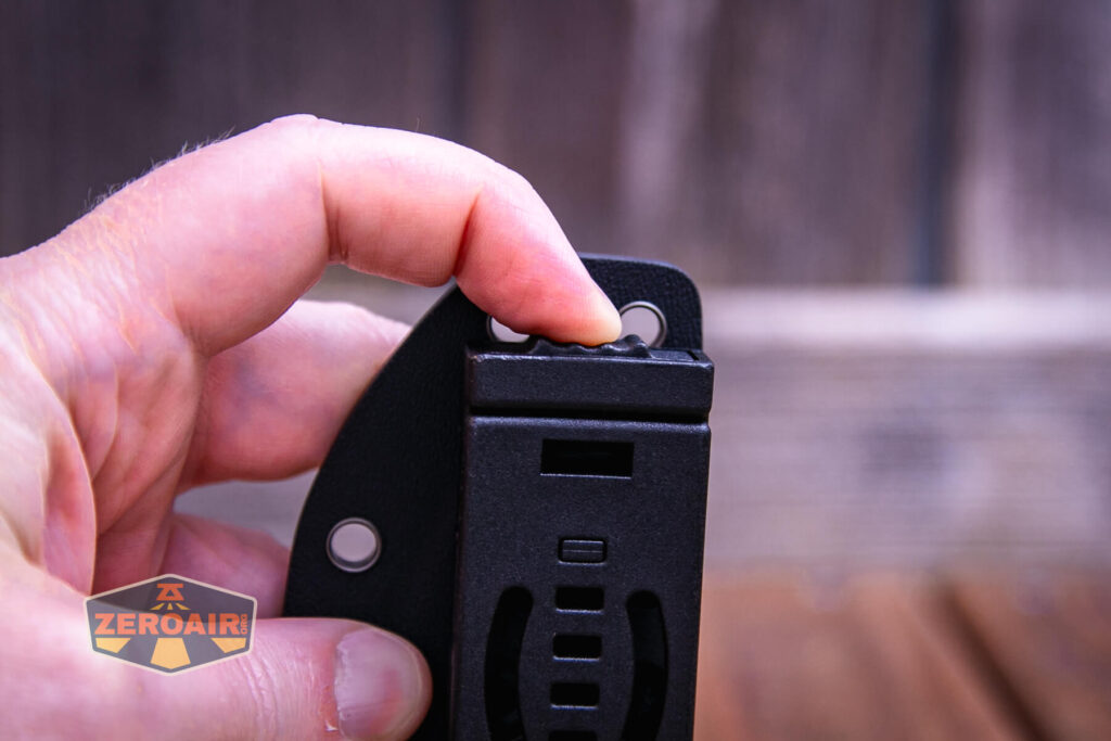 Vosteed Mink fixed-blade knife sheath quick release button pressed