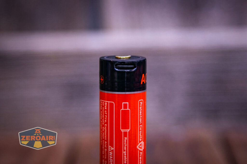 Acebeam G15 Rail-Mounted flashlight charging port on cell