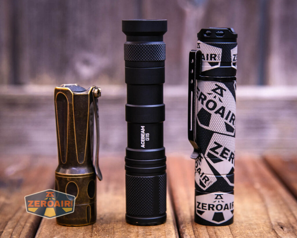 Acebeam G15 Rail-Mounted flashlight with two standard sized flashlights