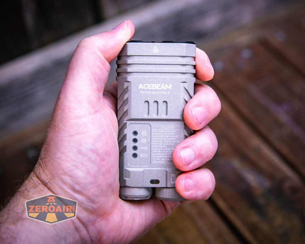 Acebeam Terminator M2-X flashlight in hand