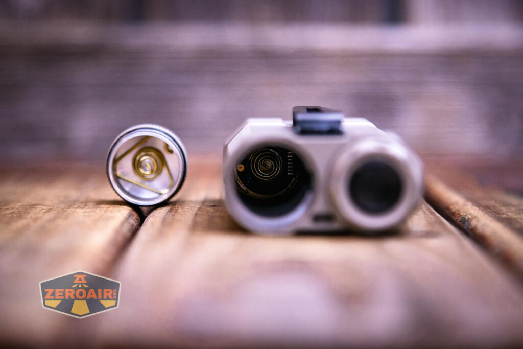 Acebeam Terminator M2-X flashlight showing springs