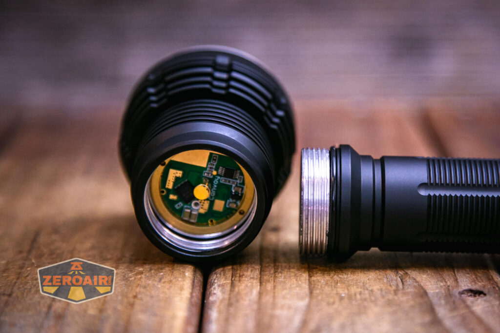 Convoy M21J 21700 flashlight showing threads on head end