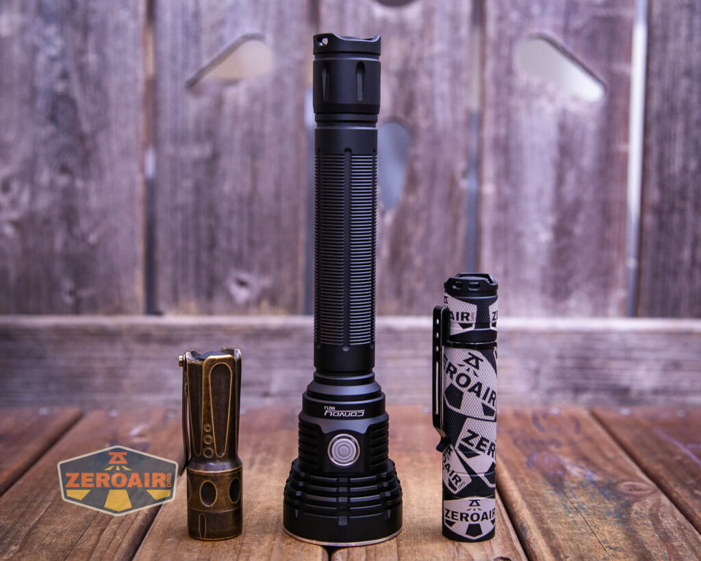 Convoy M21J 21700 flashlight with two standard sized flashlights