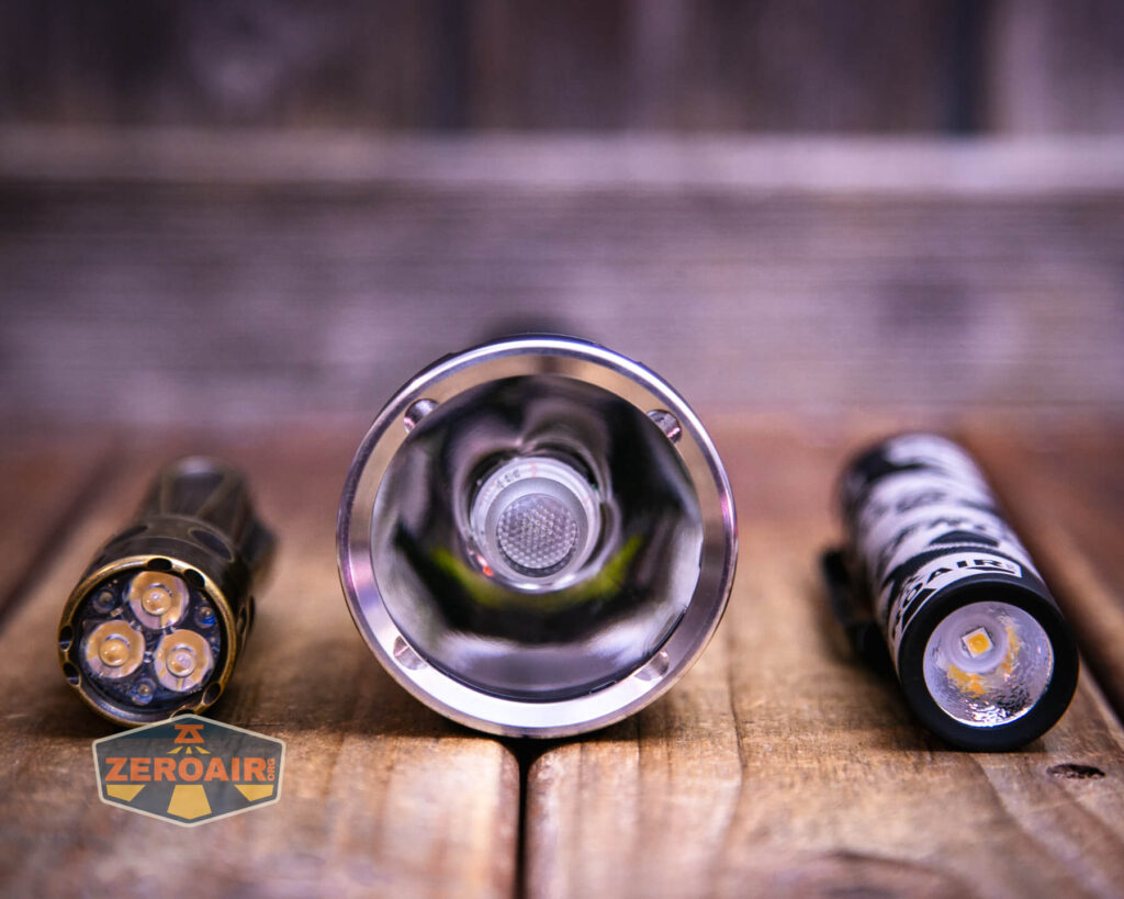 Convoy M21J 21700 flashlight with two standard sized flashlights