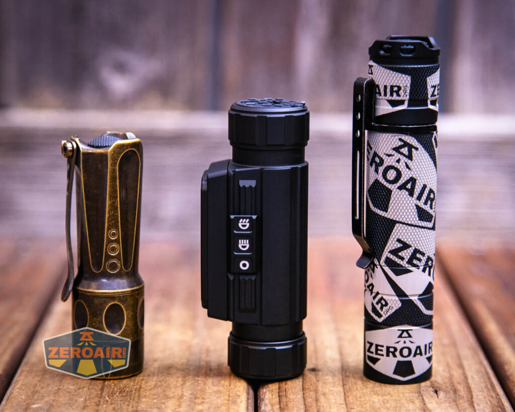 Imalent HT70 with with two standard sized flashlights