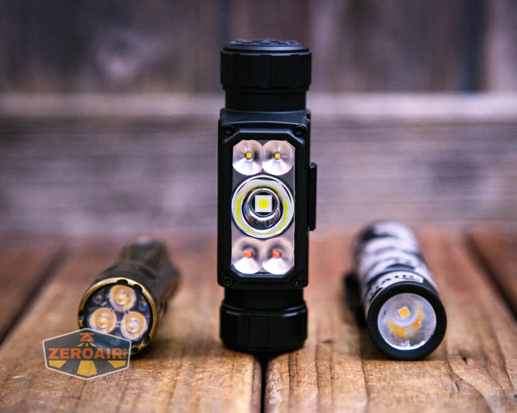 Imalent HT70 with with two standard sized flashlights