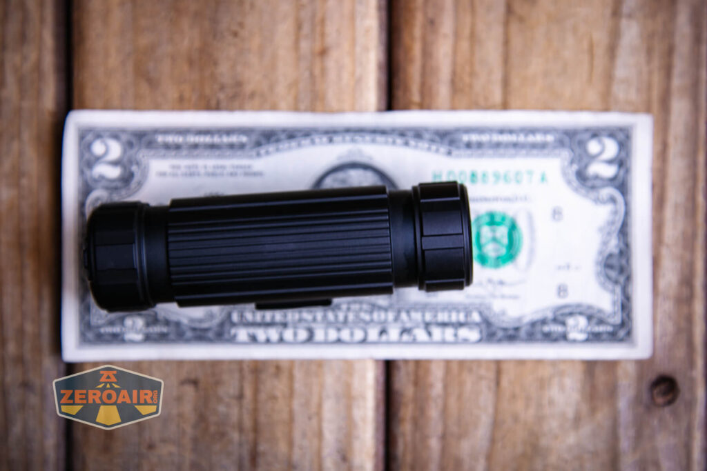 Imalent HT70 headlamp on a two dollar bill