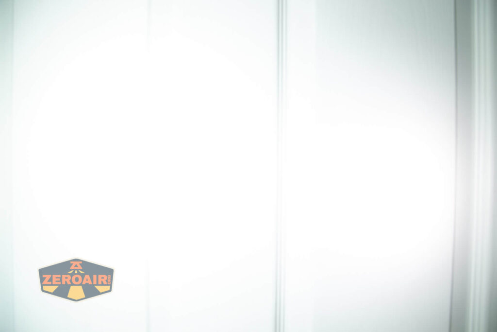 Imalent HT70 headlamp beamshots on door (at 1') compared to nichia 219b 4500K