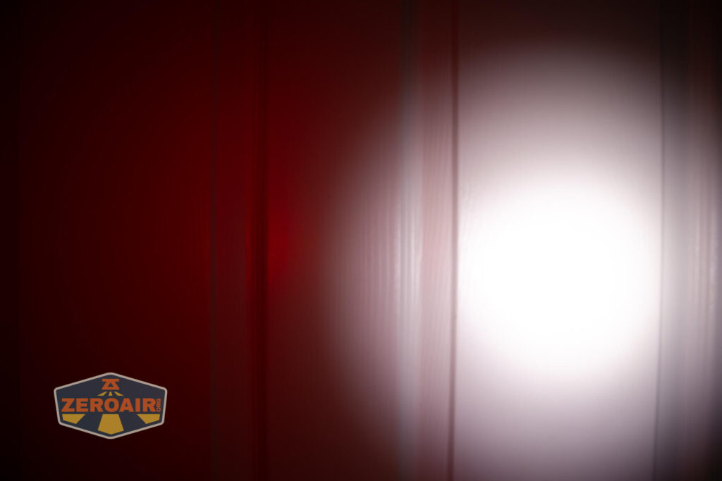 Imalent HT70 headlamp beamshots on door (at 1') compared to nichia 219b 4500K