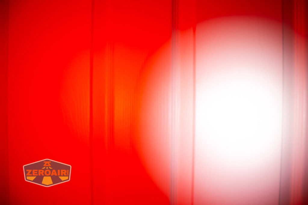 Imalent HT70 headlamp beamshots on door (at 1') compared to nichia 219b 4500K