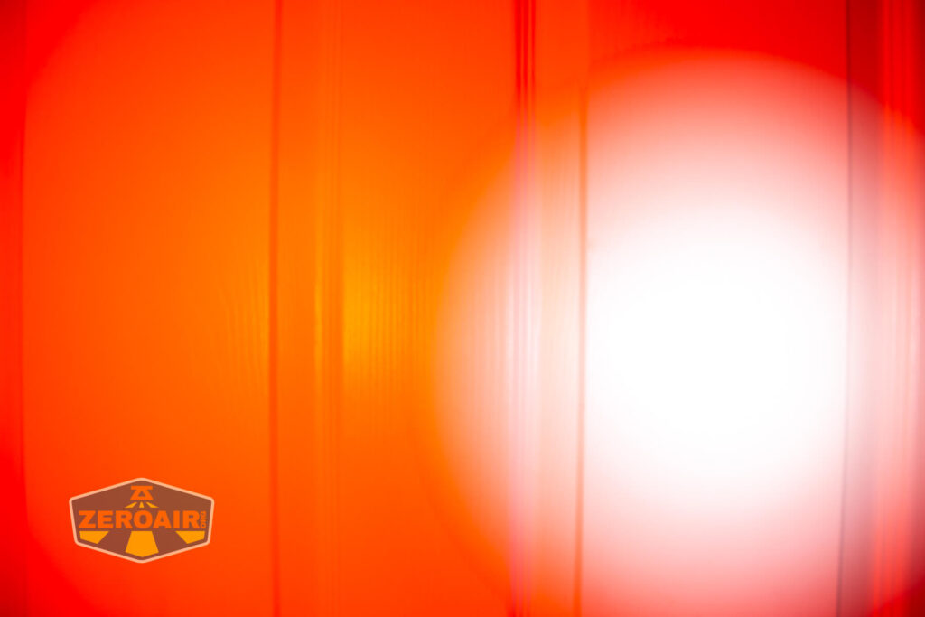 Imalent HT70 headlamp beamshots on door (at 1') compared to nichia 219b 4500K