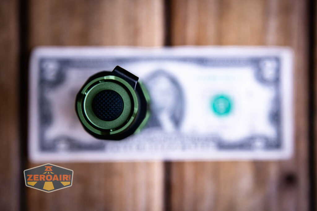 JETBeam M37 Pro flashlight on a two dollar bill