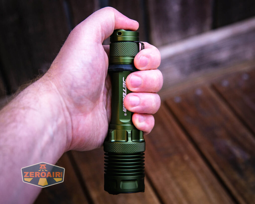 JETBeam M37 Pro flashlight in hand