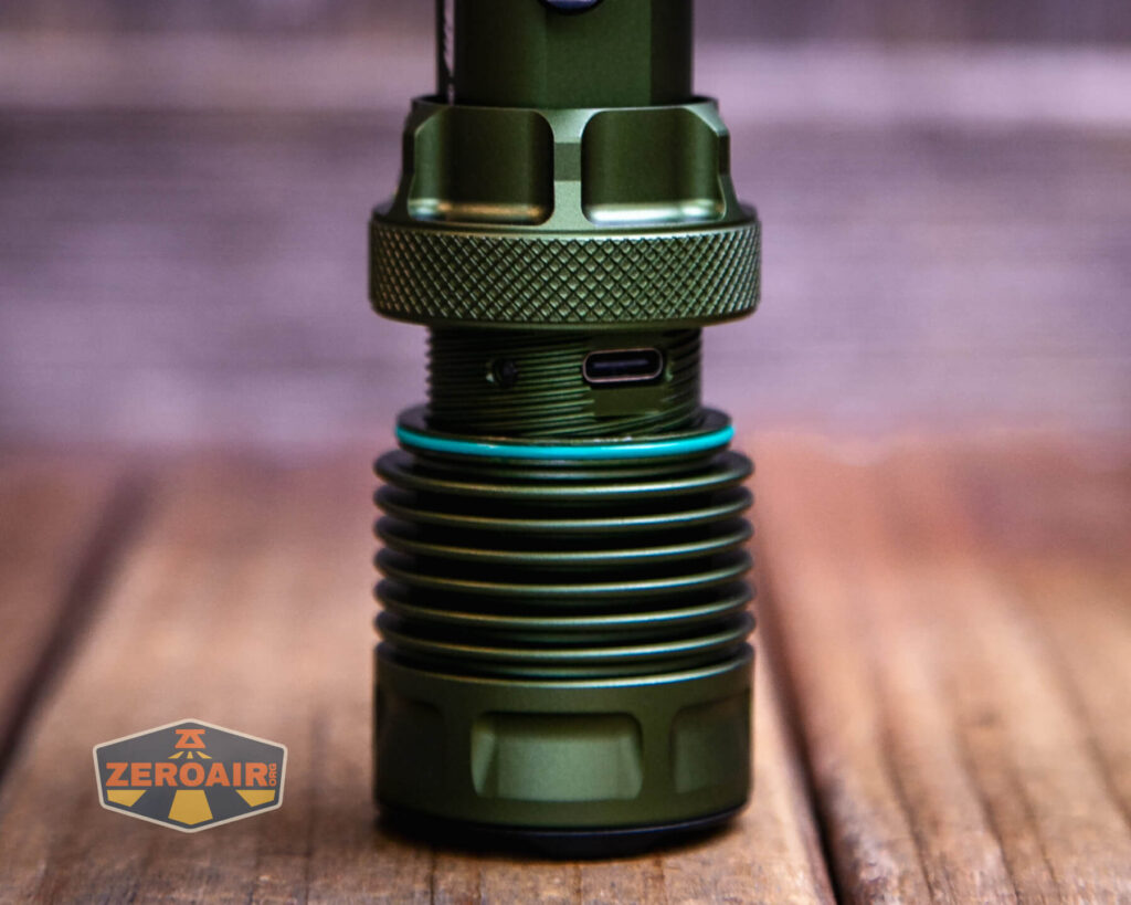 JETBeam M37 Pro flashlight charging port open