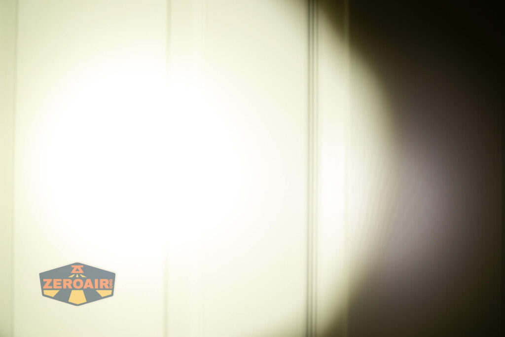 JETBeam M37 Pro flashlight beamshots on door (at 1') compared to nichia 219b 4500K