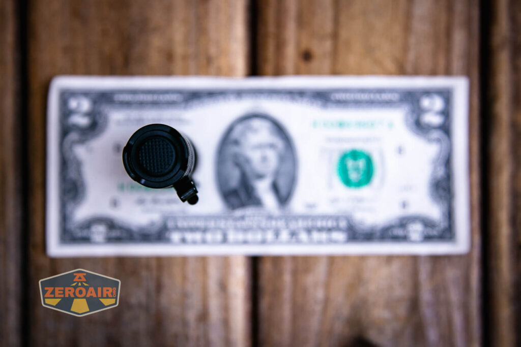 Nitecore MT1A Pro EDC flashlight on a two dollar bill