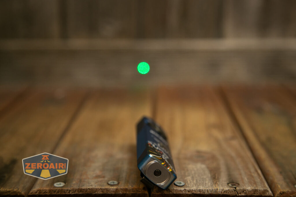 Olight Arkfeld Pro Paw Edition flashlight laser on