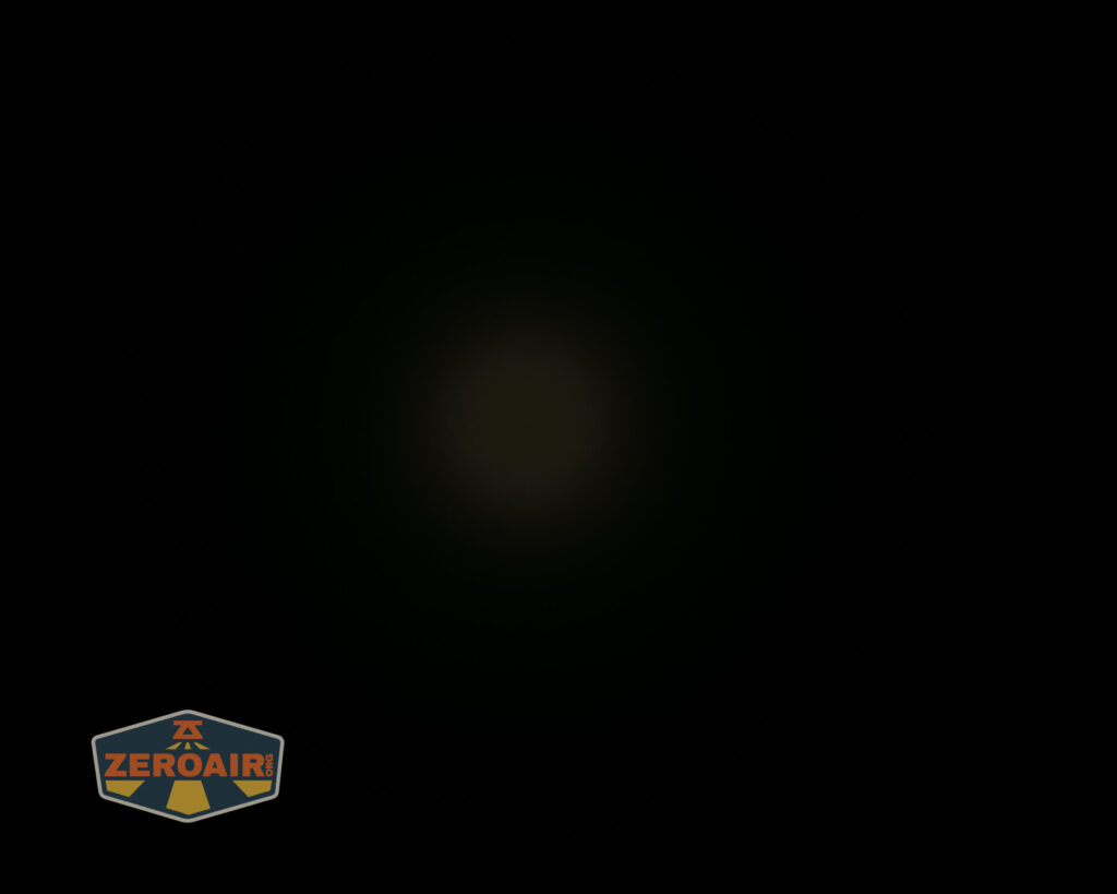 Tactile Turn Apollo flashlight beamshots on ceiling