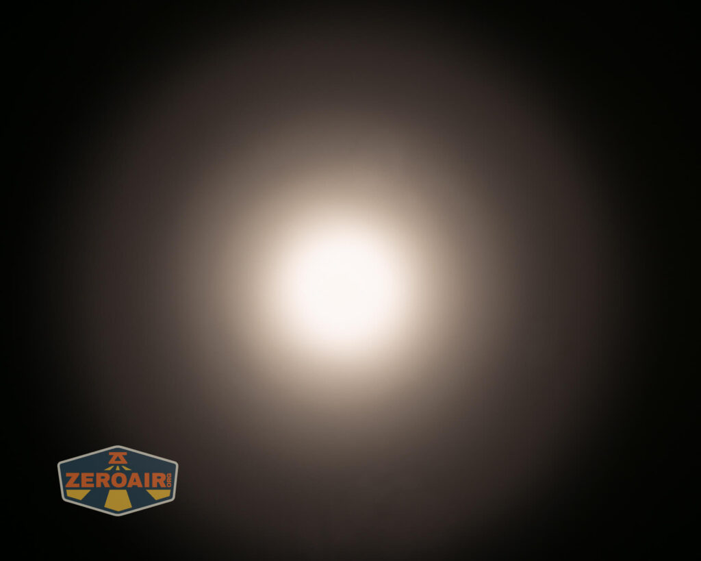 Tactile Turn Apollo flashlight beamshots on ceiling