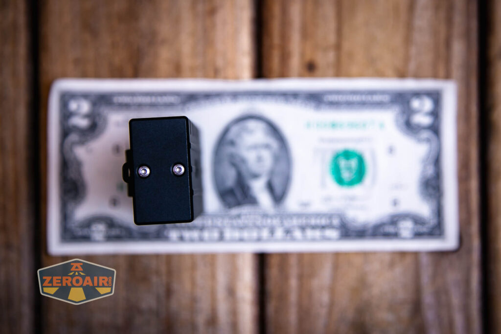 Vastlite Sima flashlight on a two dollar bill