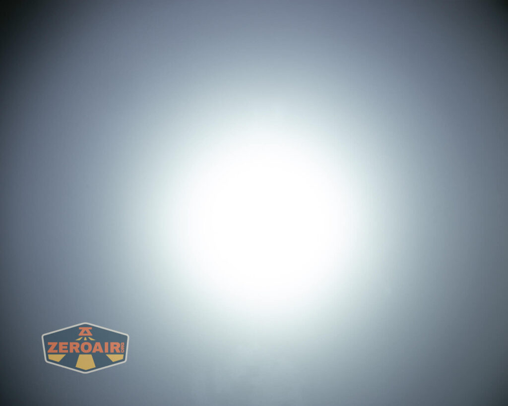 Vastlite Sima flashlight beamshots on ceiling