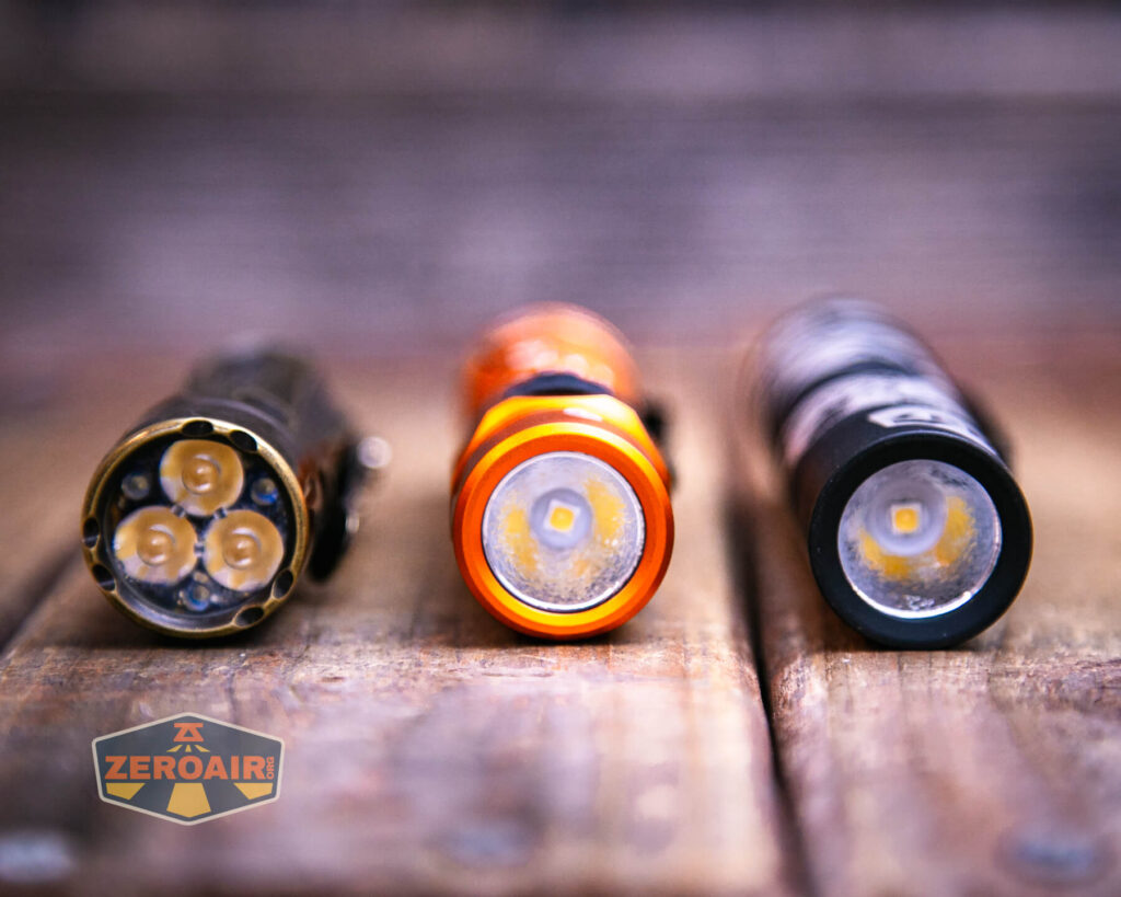 Wurkkos FC11C Halloween flashlight  with two standard sized flashlights