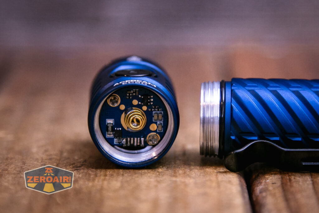 Acebeam EC20 Multi-light Source EDC flashlight head off showing threads and spring