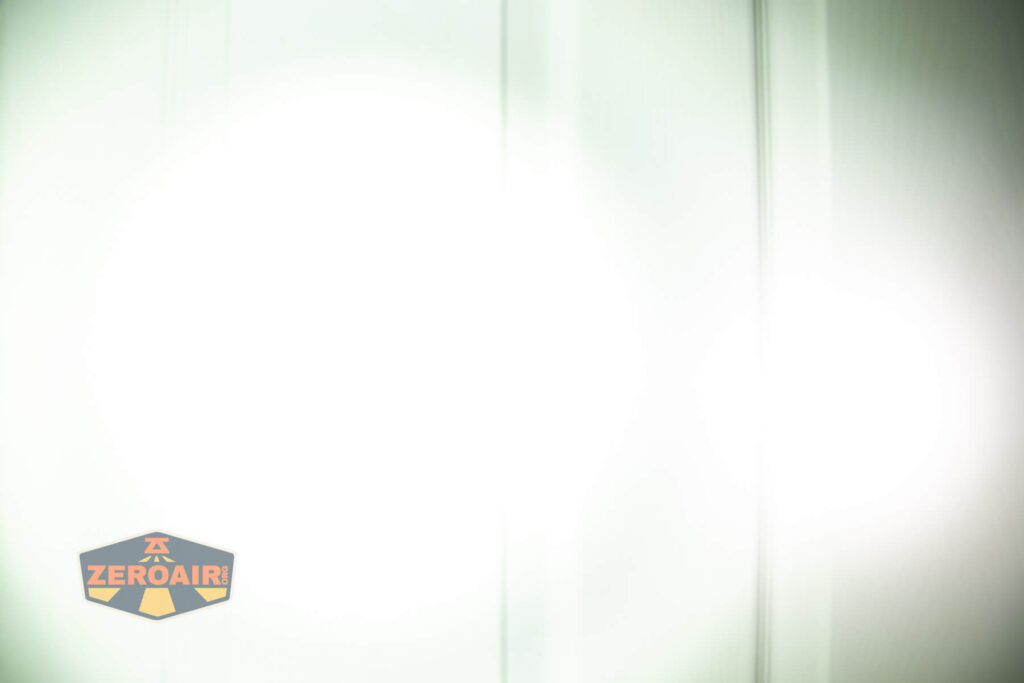 Acebeam EC20 Multi-light Source EDC flashlight beamshots on door (at 1') compared to nichia 219b 4500K