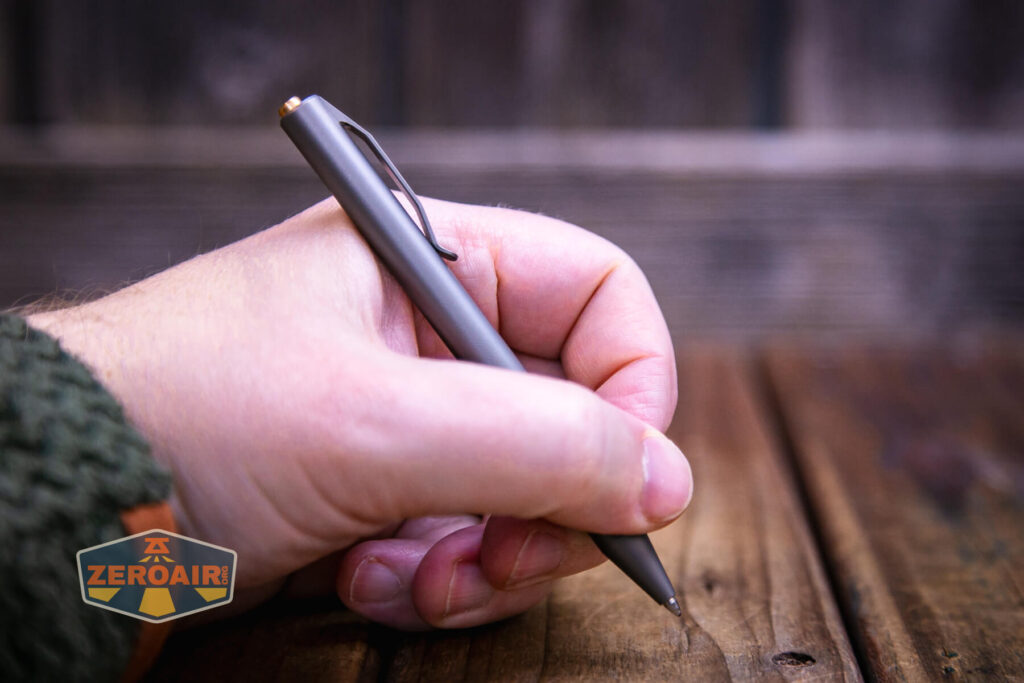 Aerocrafted Retract Click Small Pen in hand