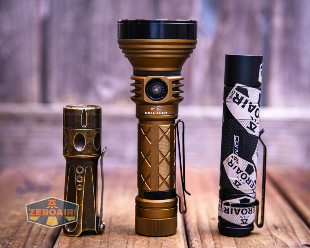 Skilhunt EC500 Coyote neutral white flashlight with two standard sized flashlights