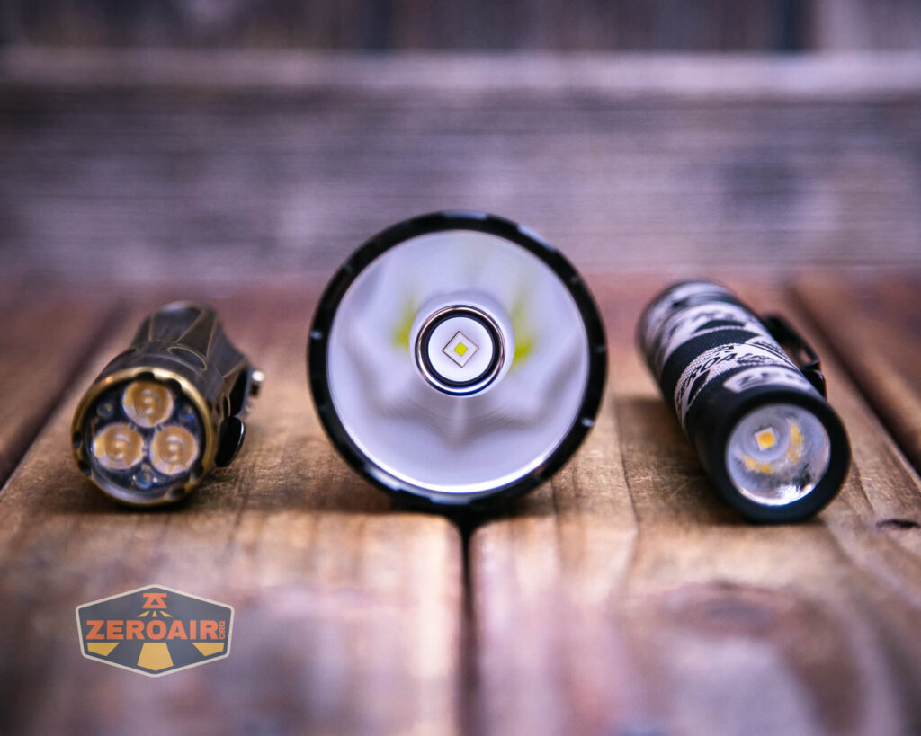 Skilhunt EC500 Coyote neutral white flashlight with two standard sized flashlights