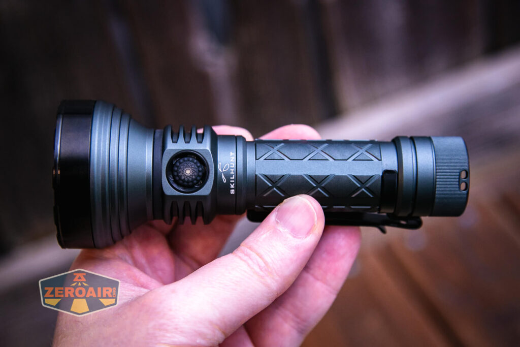 Skilhunt EC500 warm white flashlight in hand